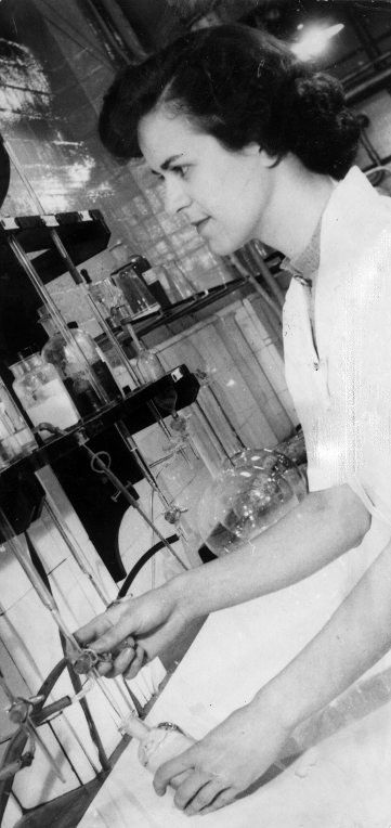 Jean Crossthwaite doing titration analysis in the lab, 1951 WP
