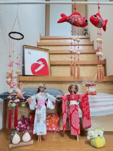 Dolls, fish and other animals and home decorations covered in material