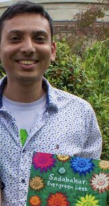 Writer Devasiachan Benny visiting an outdoor climate festival in Staffordshire