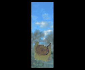 Blue sky with trees below and a thin slice of wood with a knot in the foreground
